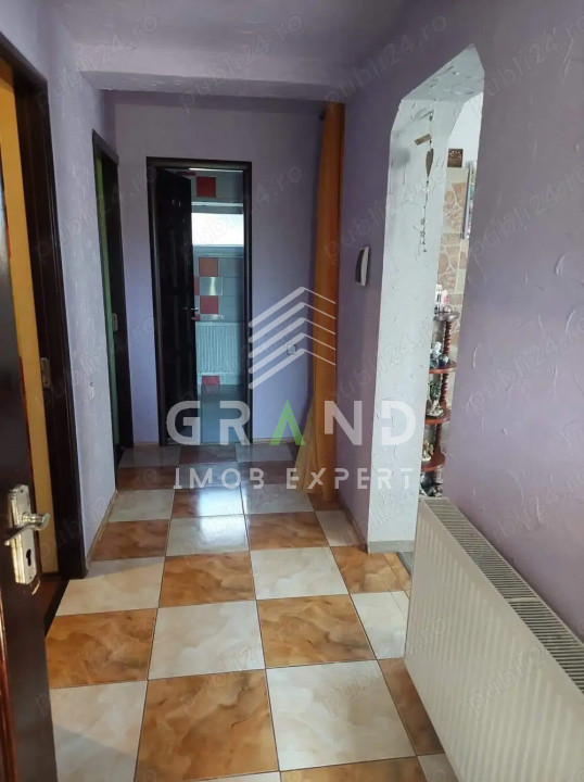 Living spațios + curte comună cu pomi, foisor și grătar – perfect pentru familie