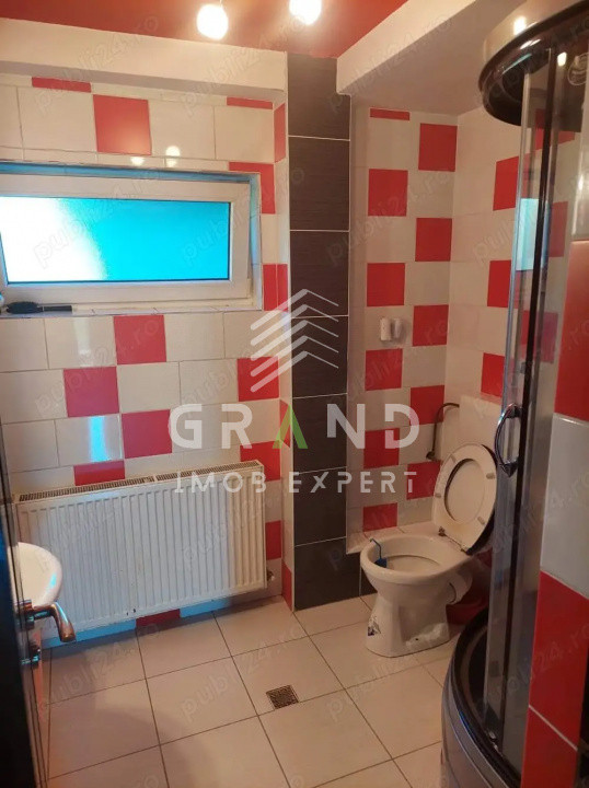 Living spațios + curte comună cu pomi, foisor și grătar – perfect pentru familie