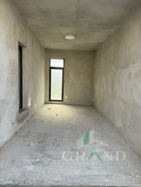 OPORTUNITATE!Casă individuală | 4 camere | 3 băi | Garaj | Terasă | Dezmir